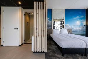 Postel nebo postele na pokoji v ubytování Hotel Waterstate