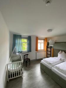 Postel nebo postele na pokoji v ubytování Hostel Balingen