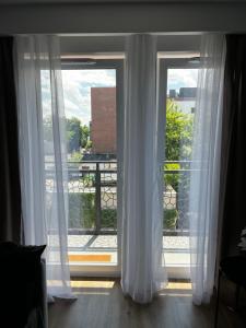Balkón nebo terasa v ubytování Wygodny Apartament Piotrkowska Centrum