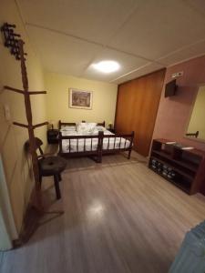 Cama ou camas em um quarto em Pousada Toca das Bromelias mais 36 fotos