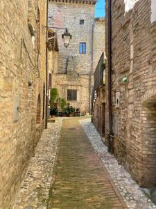 an alley way in an old stone building at Casa al Castello in Petrignano