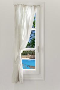 Fotografie z fotogalerie ubytování Margarita Studios Ambelas v destinaci Ambelas