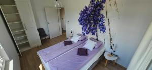 Postel nebo postele na pokoji v ubytování Willa Lawenda i Rumianek