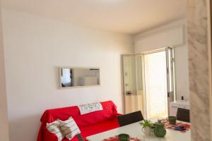 TV a/nebo společenská místnost v ubytování Casa Ezio 1 fronte mare a Punta Grossa di Punta Prosciutto