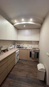 Kuchyň nebo kuchyňský kout v ubytování John Apartment 2