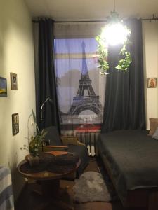 Ένα ή περισσότερα κρεβάτια σε δωμάτιο στο Studija virš cukrainės Druskininkuose