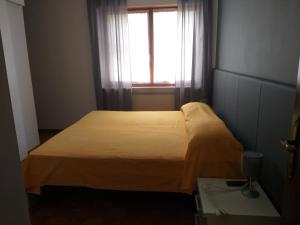 Postel nebo postele na pokoji v ubytování B&B DA ROBERTINO