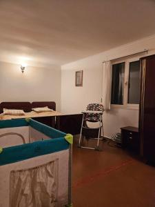 Ένα ή περισσότερα κρεβάτια σε δωμάτιο στο Sevan Guest House