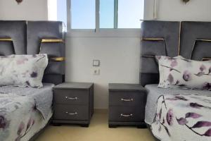 Postel nebo postele na pokoji v ubytování Belle maison bon prix