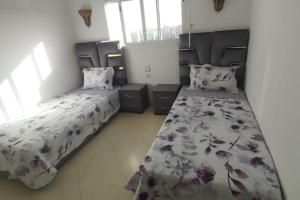 Postel nebo postele na pokoji v ubytování Belle maison bon prix