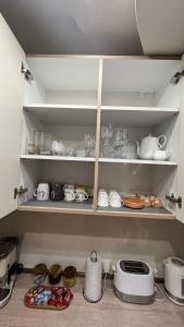 Kuchyň nebo kuchyňský kout v ubytování John Apartment 2
