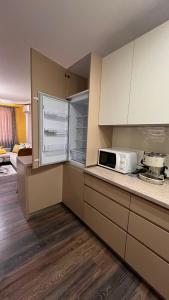 Kuchyň nebo kuchyňský kout v ubytování John Apartment 2