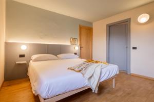 Postel nebo postele na pokoji v ubytování Bubamara - Bed and Breakfast