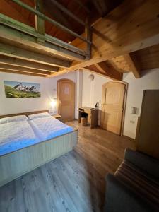 Postel nebo postele na pokoji v ubytování Garni Eden Bed and breakfast