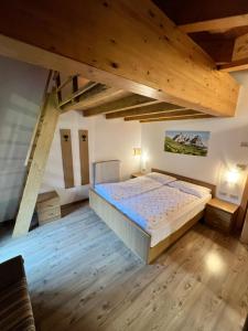 Postel nebo postele na pokoji v ubytování Garni Eden Bed and breakfast