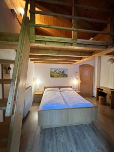 Postel nebo postele na pokoji v ubytování Garni Eden Bed and breakfast