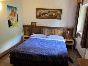 Postel nebo postele na pokoji v ubytování Garni Eden Bed and breakfast
