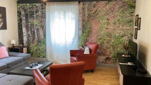 Zona de estar de appartement Vintage a l ancienne forge