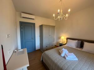 Postel nebo postele na pokoji v ubytování Bed & Breakfast Lupis