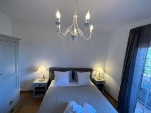 Postel nebo postele na pokoji v ubytování Bed & Breakfast Lupis