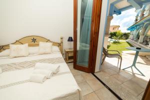 Postel nebo postele na pokoji v ubytování GH Diana Hotel + 49 fotografií