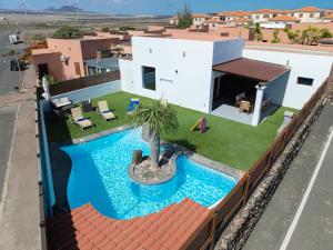 an overhead view of a house with a swimming pool at Villa Mahor in La Oliva