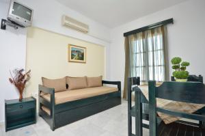 Khu vực ghế ngồi tại Dilino Hotel Studios