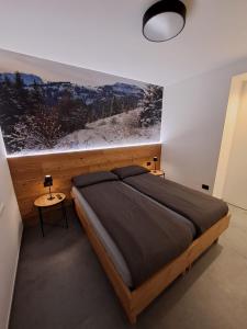 Postel nebo postele na pokoji v ubytování Il NIDO DEL PELLER