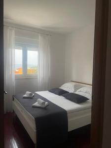 Postel nebo postele na pokoji v ubytování Apartment Marijeta Makarska