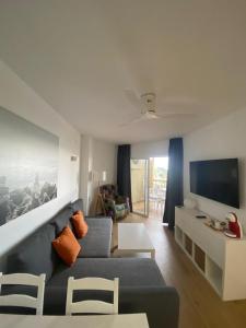 Televízia a/alebo spoločenská miestnosť v ubytovaní CHINASOLYMAR LUXURY - Con Parking
