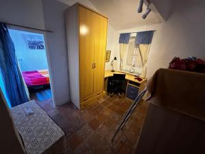 En eller flere senge i et værelse på Casa del Músico