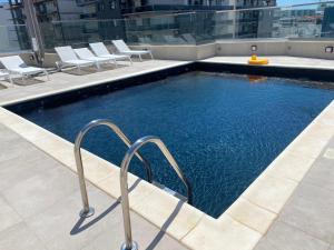 a swimming pool on top of a building at L&C Platinum Property in Năvodari