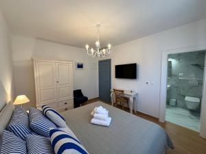 Postel nebo postele na pokoji v ubytování Bed & Breakfast Lupis