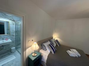 Postel nebo postele na pokoji v ubytování Bed & Breakfast Lupis