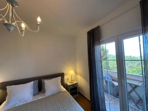 Postel nebo postele na pokoji v ubytování Bed & Breakfast Lupis