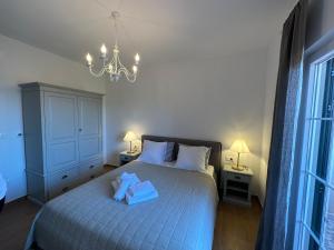 Postel nebo postele na pokoji v ubytování Bed & Breakfast Lupis