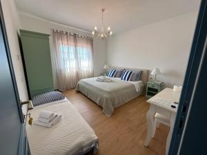 Postel nebo postele na pokoji v ubytování Bed & Breakfast Lupis