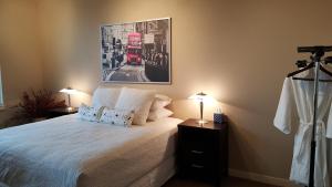 a bedroom with a bed and a red bus at Orenco Lofts in Hillsboro