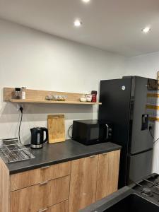 Kuchyňa alebo kuchynka v ubytovaní BlueApartment