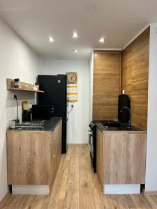 Kuchyňa alebo kuchynka v ubytovaní BlueApartment