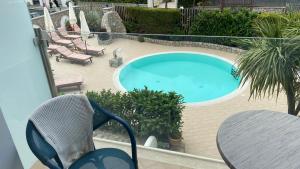 Bazén v ubytování Capri Bougainville Luxury Boutique Hotel nebo v jeho okolí