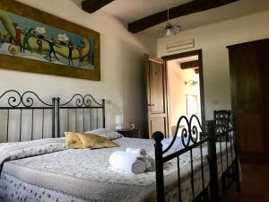 Postel nebo postele na pokoji v ubytování Agriturismo Melodie Toscane Sorano