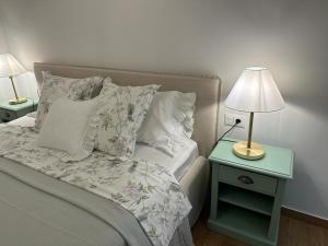 Postel nebo postele na pokoji v ubytování Bed & Breakfast Lupis