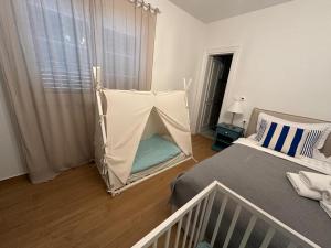 Postel nebo postele na pokoji v ubytování Bed & Breakfast Lupis