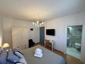 Postel nebo postele na pokoji v ubytování Bed & Breakfast Lupis
