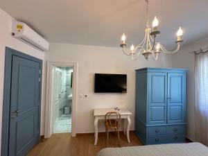 TV a/nebo společenská místnost v ubytování Bed & Breakfast Lupis