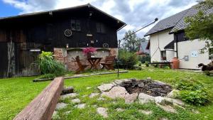 Vonkajšia záhrada v ubytovaní Apartamenty GOSZOWIANKA