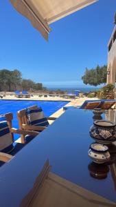 Πισίνα στο ή κοντά στο Villa vue mer et campagne