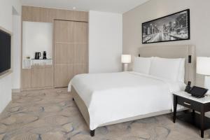 Uma cama ou camas num quarto em JW Marriott Hotel Marina