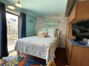 Postel nebo postele na pokoji v ubytování NC 12 56821-34 Condo